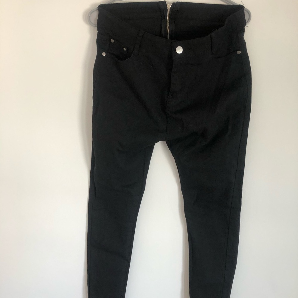 Zip through around black ankle jeans